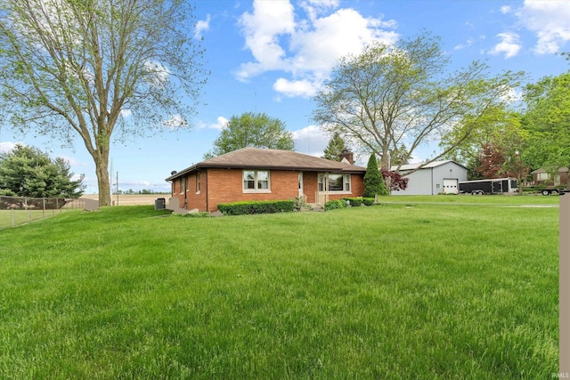 view of front of house featuring a chimney and brick siding