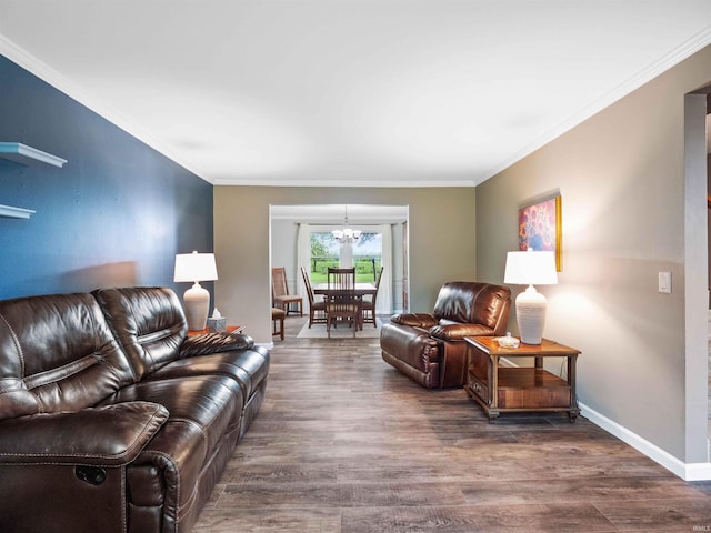 4904 Live Oak Ct, Fort Wayne, IN 46804 - living area featuring dark wood finished floors, a chandelier, crown molding, and baseboards