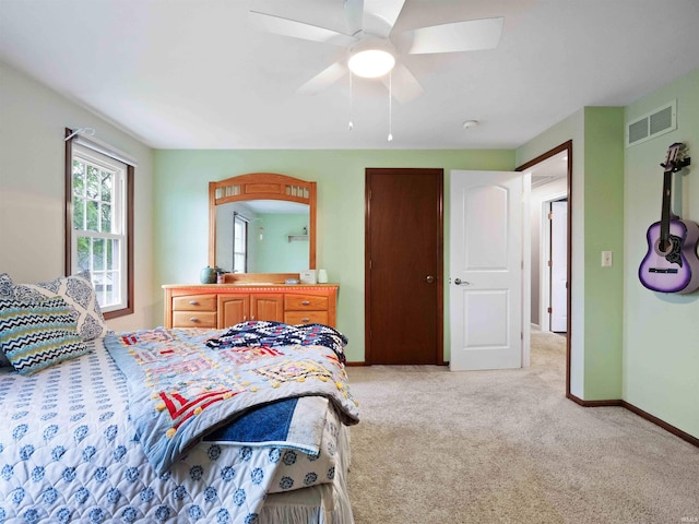 4904 Live Oak Ct, Fort Wayne, IN 46804 - bedroom featuring light colored carpet, baseboards, and ceiling fan
