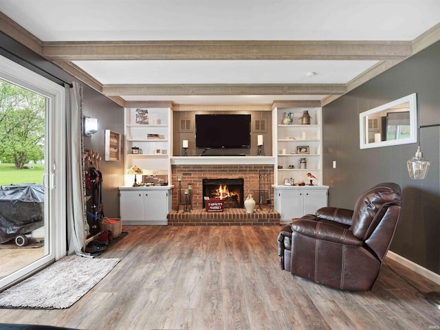 4904 Live Oak Ct, Fort Wayne, IN 46804 - living area featuring wood finished floors, beam ceiling, and a fireplace