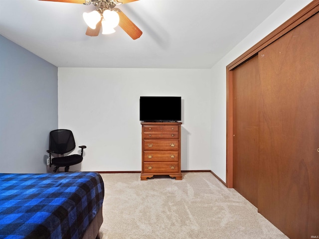 4904 Live Oak Ct, Fort Wayne, IN 46804 - bedroom with carpet flooring, baseboards, a ceiling fan, and a closet