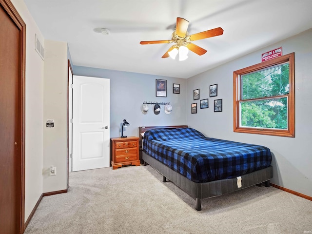 4904 Live Oak Ct, Fort Wayne, IN 46804 - carpeted bedroom with baseboards and a ceiling fan