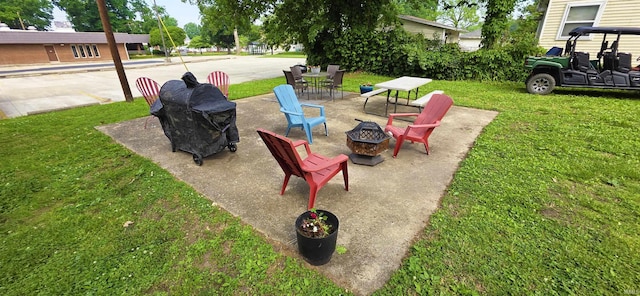 718 N Cherry St, Mount Carmel, IL 62439 - view of patio / terrace with a fire pit