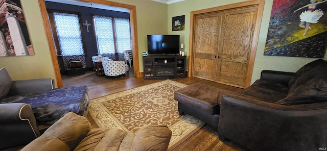 718 N Cherry St, Mount Carmel, IL 62439 - living room featuring wood finished floors and ornamental molding
