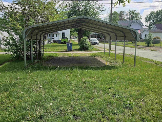 552 Heath St, Logansport, IN 46947 - view of car parking with a detached carport and driveway