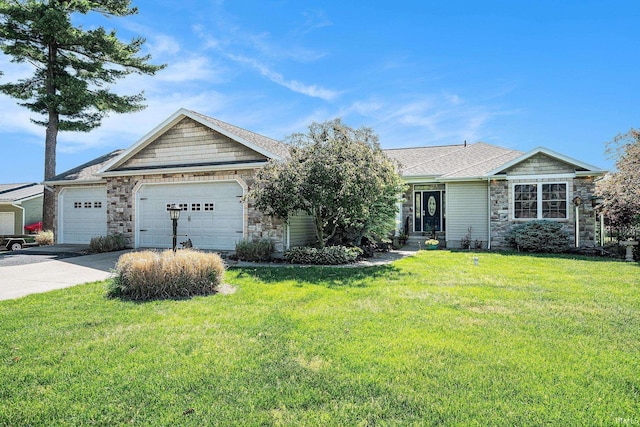 53 Ems C29 Ln, Warsaw, IN 46582 - ranch-style home with a garage, concrete driveway, stone siding, and a front lawn