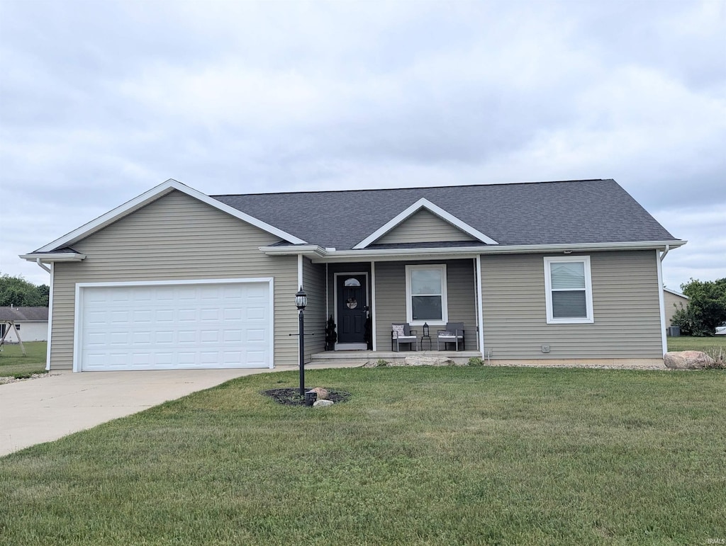 ranch-style house featuring covered porch, concrete driveway, an attached garage, a front yard, and a shingled roof