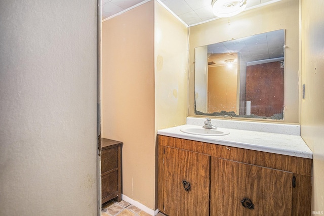 19401 Burke St, South Bend, IN 46637 - bathroom featuring ornamental molding, vanity, and tile patterned floors