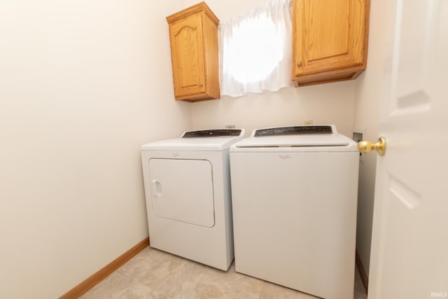 4010 S Falcon Dr, Bloomington, IN 47403 - laundry area with cabinet space, independent washer and dryer, and baseboards