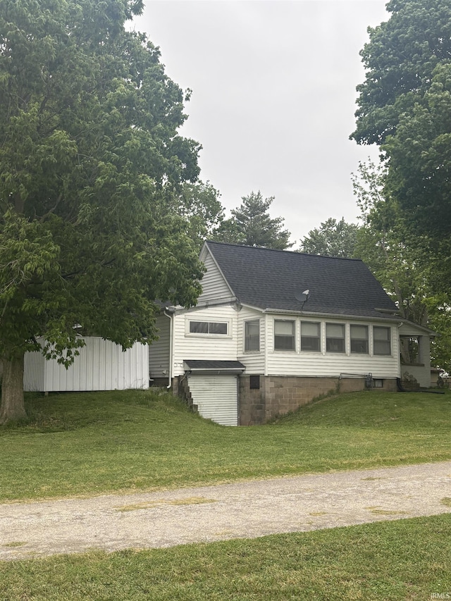 504 N Myra St, Worthington, IN 47471 - view of front of house with a front lawn and roof with shingles
