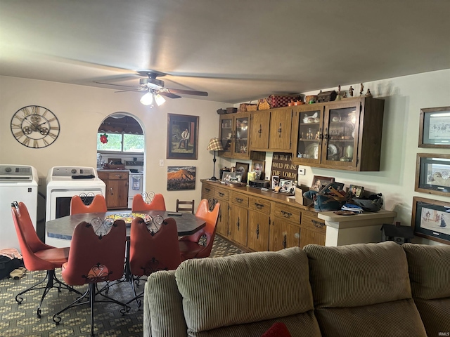 504 N Myra St, Worthington, IN 47471 - living area with ceiling fan and washing machine and dryer