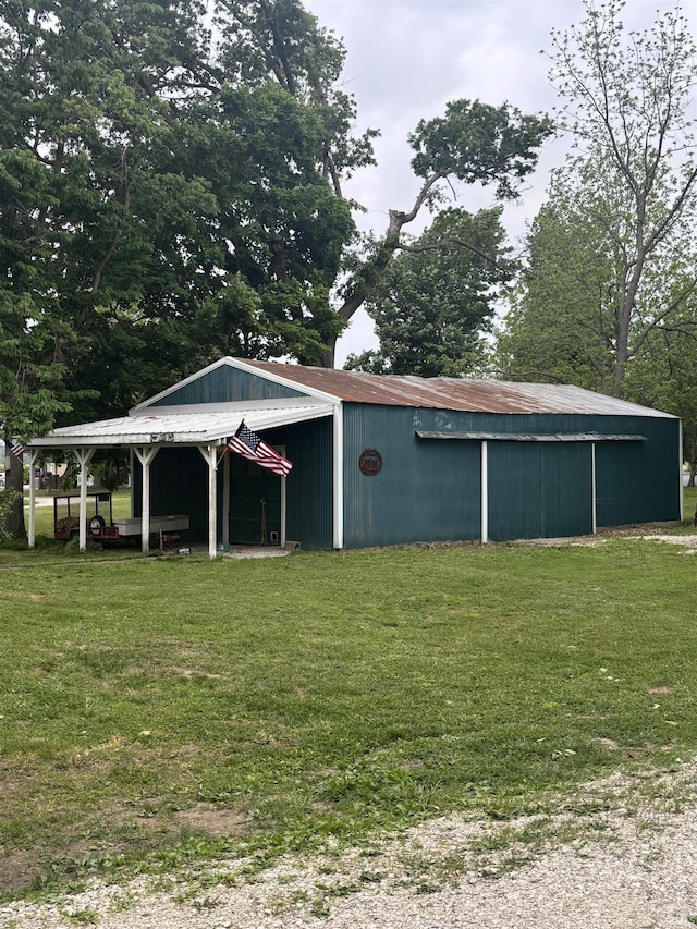 504 N Myra St, Worthington, IN 47471 - view of pole building featuring a yard