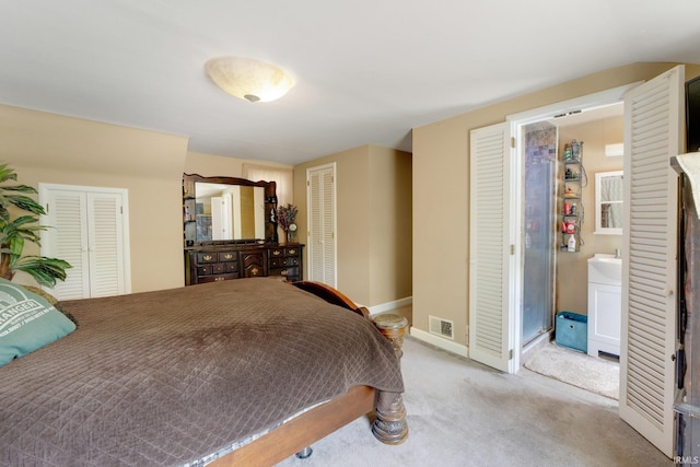 carpeted bedroom featuring baseboards