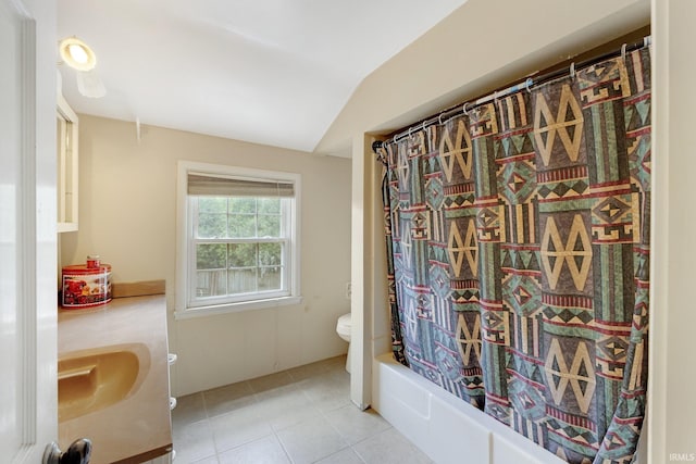 full bathroom featuring toilet, tile patterned floors, vanity, lofted ceiling, and shower / bath combination with curtain