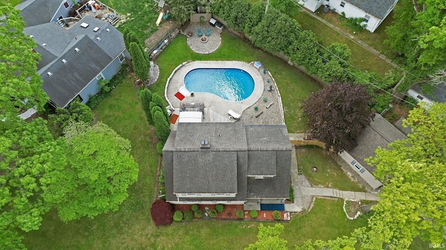 view of subject property featuring a pool