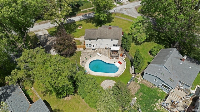 view of property location featuring a pool