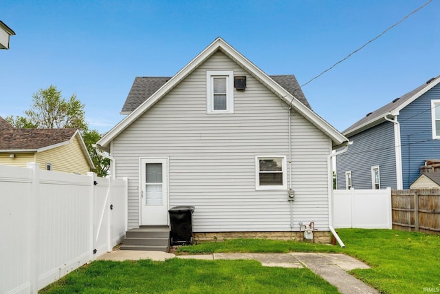 217 S Hamsher St, Garrett, IN 46738 - back of property featuring a shingled roof
