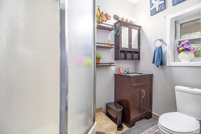 1652 N Sheridan St, South Bend, IN 46628 - full bathroom with a stall shower, baseboards, toilet, and vanity