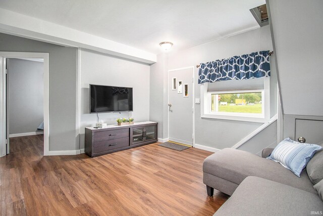 1652 N Sheridan St, South Bend, IN 46628 - living area with wood finished floors and baseboards