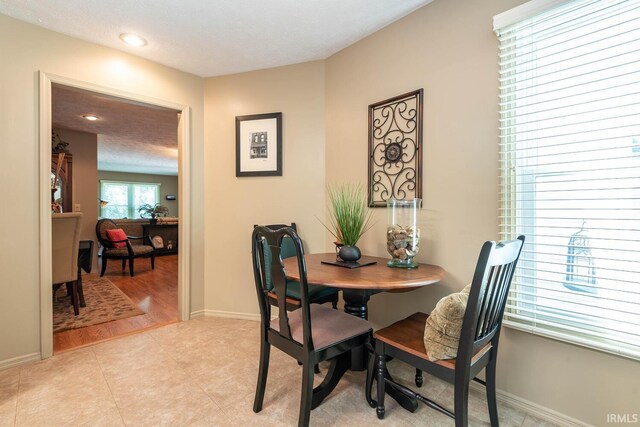682 E Heather Dr, Bloomington, IN 47401 - dining area with baseboards