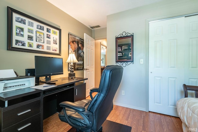 682 E Heather Dr, Bloomington, IN 47401 - office area featuring wood finished floors and baseboards