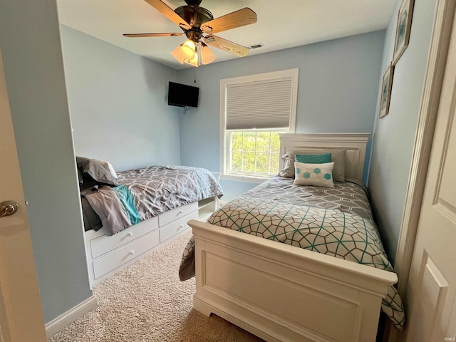 1620 Colonial Dr, Rochester, IN 46975 - carpeted bedroom featuring baseboards and a ceiling fan
