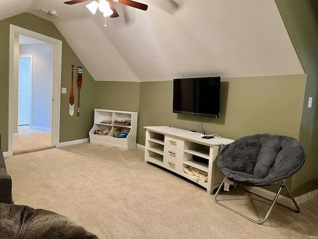 1620 Colonial Dr, Rochester, IN 46975 - interior space featuring a ceiling fan, light colored carpet, vaulted ceiling, and baseboards