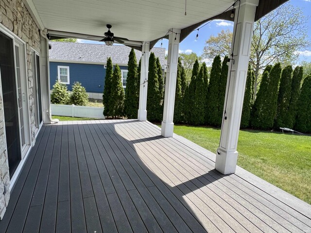 1620 Colonial Dr, Rochester, IN 46975 - wooden deck with a lawn and a ceiling fan
