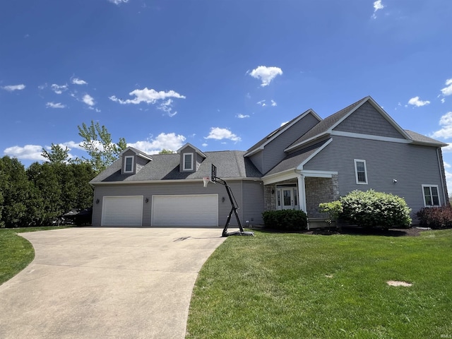 1620 Colonial Dr, Rochester, IN 46975 - view of front of house with a front yard, concrete driveway, a garage, and a shingled roof