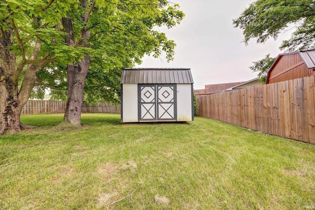 7215 W Mustang Dr, Ellettsville, IN 47429 - view of yard featuring a storage shed and an outbuilding