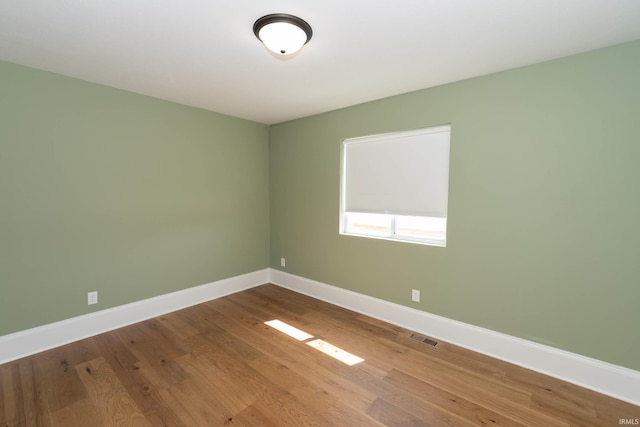 30512 Jaxon Dr, Elkhart, IN 46517 - empty room with baseboards and wood finished floors