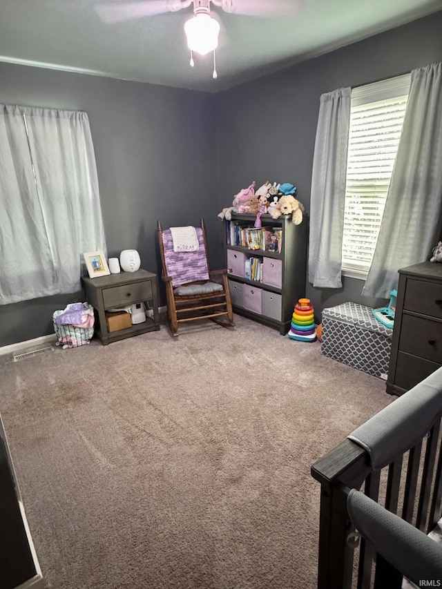 701 N Lincoln Ave, Rockport, IN 47635 - bedroom featuring carpet, a ceiling fan, and a nursery area