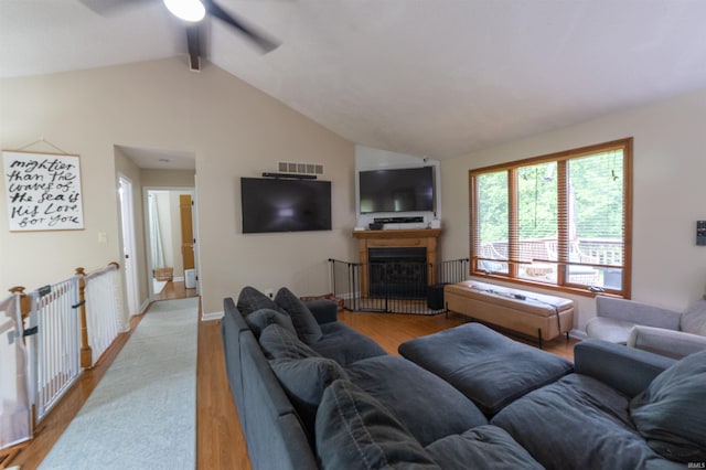 6330 Gardner Rd, Chandler, IN 47610 - living room with ceiling fan, a fireplace, and light wood-style floors