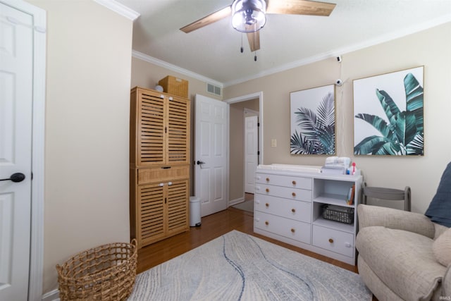 6330 Gardner Rd, Chandler, IN 47610 - bedroom featuring crown molding, wood finished floors, and a ceiling fan