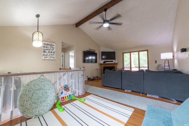 6330 Gardner Rd, Chandler, IN 47610 - living room with wood finished floors, ceiling fan, and a fireplace