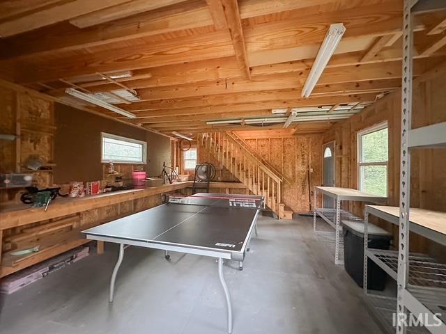 6330 Gardner Rd, Chandler, IN 47610 - playroom featuring plenty of natural light, concrete floors, and a workshop area