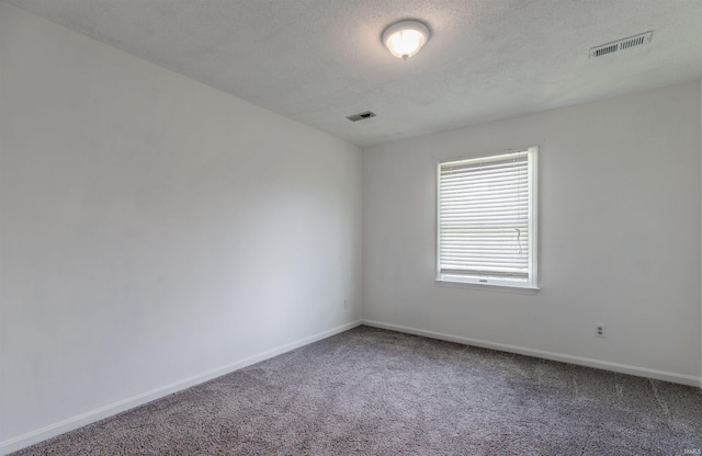 7860 Cedar Ridge Dr, Evansville, IN 47715 - carpeted spare room with baseboards and a textured ceiling