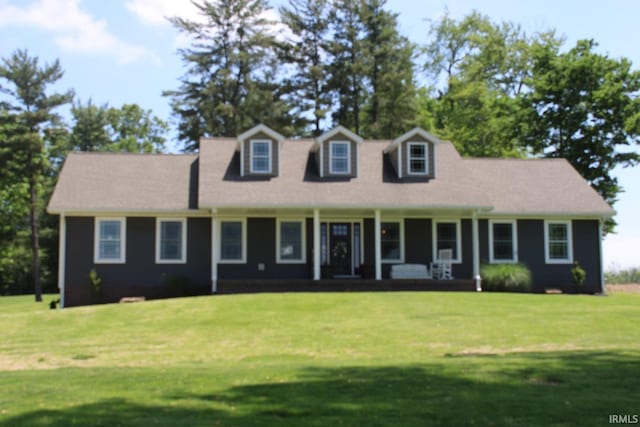 cape cod-style house with a front yard and a porch