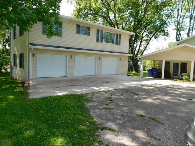 1702 Valley View Dr, Bedford, IN 47421 - view of front of property with a garage and driveway