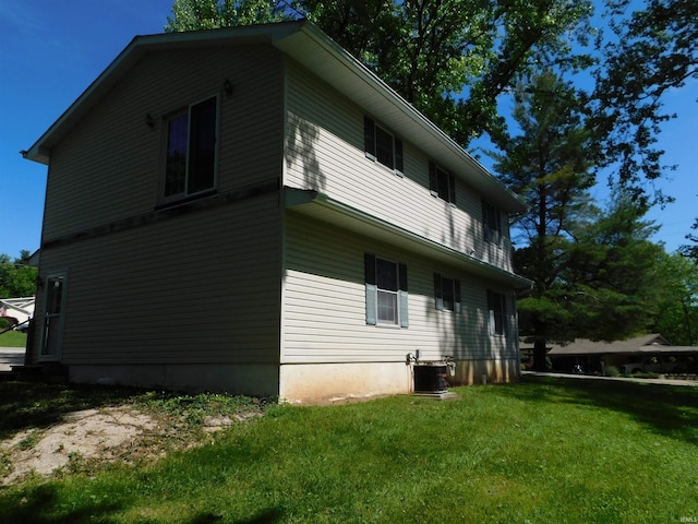 1702 Valley View Dr, Bedford, IN 47421 - view of side of property featuring cooling unit and a lawn