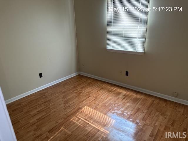 4415 Richfield Ln, Fort Wayne, IN 46816 - empty room with wood finished floors and baseboards