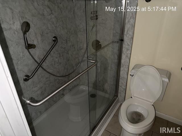 4415 Richfield Ln, Fort Wayne, IN 46816 - bathroom with toilet, a shower stall, and tile patterned floors