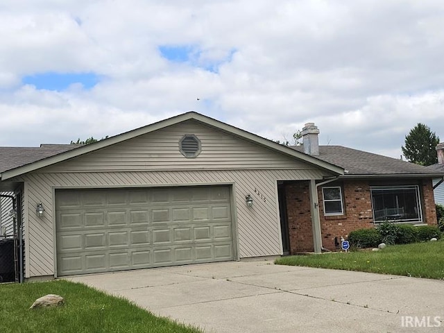 4415 Richfield Ln, Fort Wayne, IN 46816 - single story home with driveway, an attached garage, a chimney, and brick siding