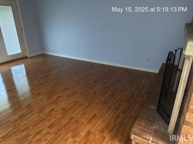 4415 Richfield Ln, Fort Wayne, IN 46816 - unfurnished room featuring dark wood finished floors and baseboards