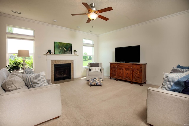 224 Aqueduct Cir, West Lafayette, IN 47906 - carpeted living room featuring ornamental molding, a ceiling fan, a fireplace with flush hearth, and baseboards