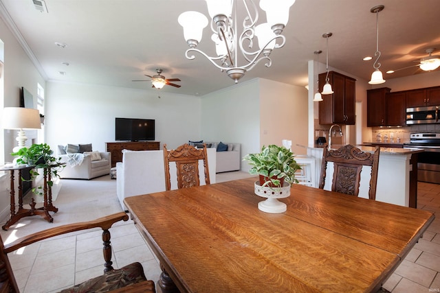 224 Aqueduct Cir, West Lafayette, IN 47906 - dining area featuring a ceiling fan, light tile patterned flooring, crown molding, and a chandelier