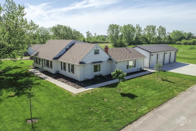 1809 E Royerton Rd, Muncie, IN 47303 - ranch-style house featuring a detached garage, a chimney, and a front yard