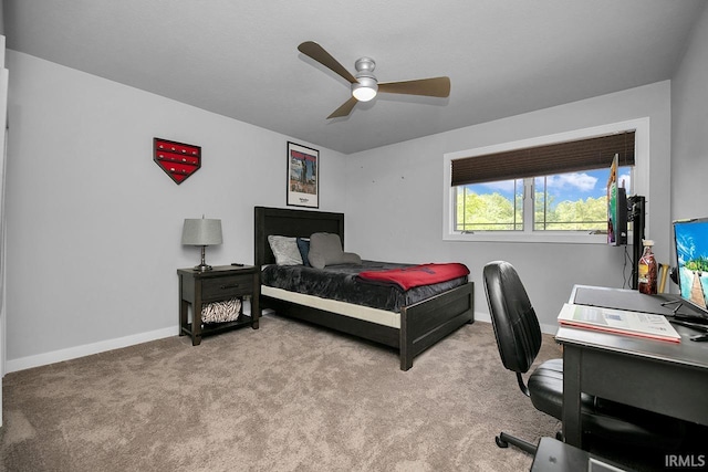 19861 County Road 16, Bristol, IN 46507 - bedroom with baseboards, a desk, carpet flooring, and a ceiling fan