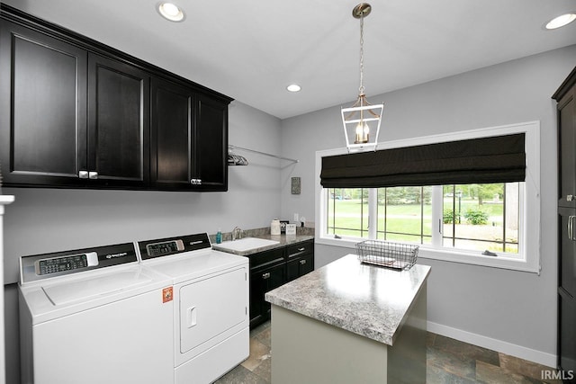 19861 County Road 16, Bristol, IN 46507 - laundry area with cabinet space, separate washer and dryer, baseboards, recessed lighting, and dark stone finish floors