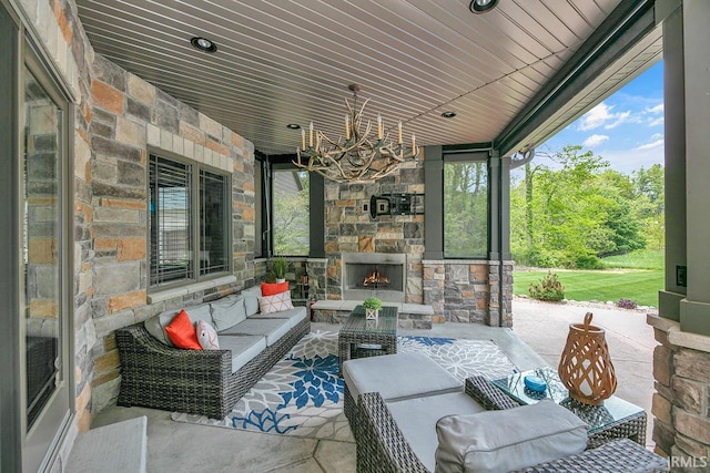 19861 County Road 16, Bristol, IN 46507 - view of patio / terrace with an outdoor living space with a fireplace